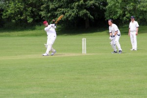 Tim launches a hapless OTO bowler over midwicket